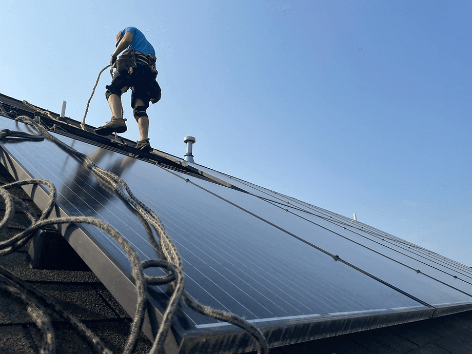 Sunset Roofing crew and equipment on site during a roof project